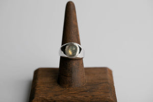 Sterling silver 10mm x 8mm oval cabochon silver labradorite bezel set ring by Brian Bibeau Designs.