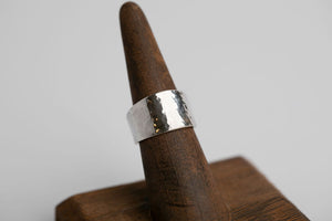 Sterling silver cigar band with a textured, hammered finish ring by Brian Bibeau Designs.