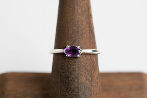 Amethyst Oval Stacker: Sterling silver 4x6 oval faceted amethyst 4 prong set ring by Brian Bibeau Designs.